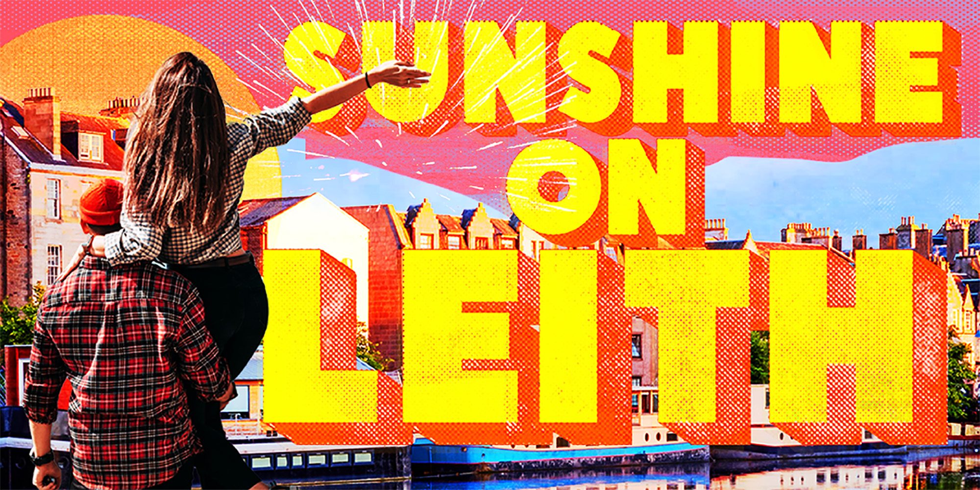 A man holding a woman in one arm facing away towards buildings with barges on a canal