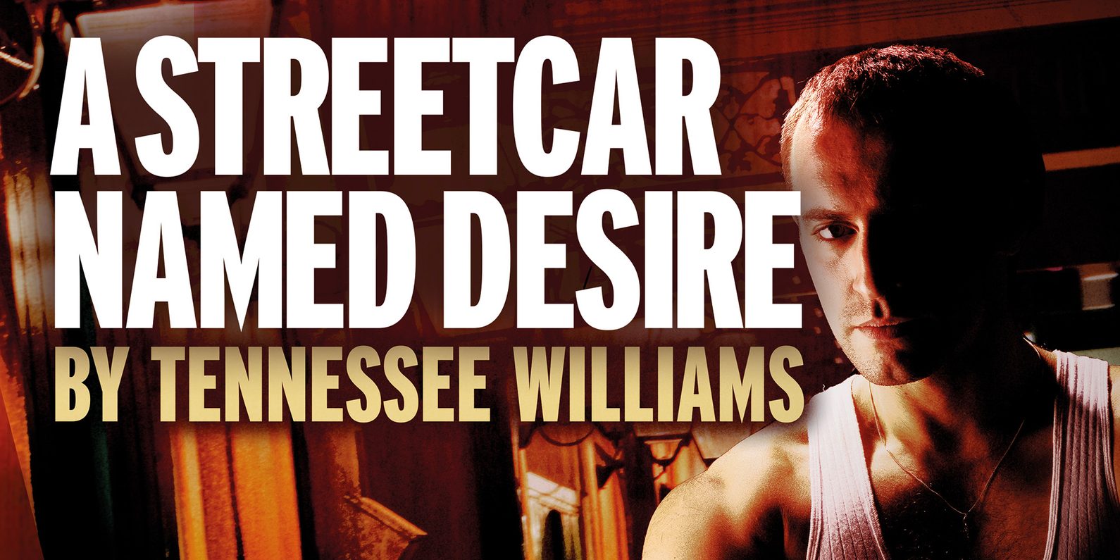 A mans face in shadow.