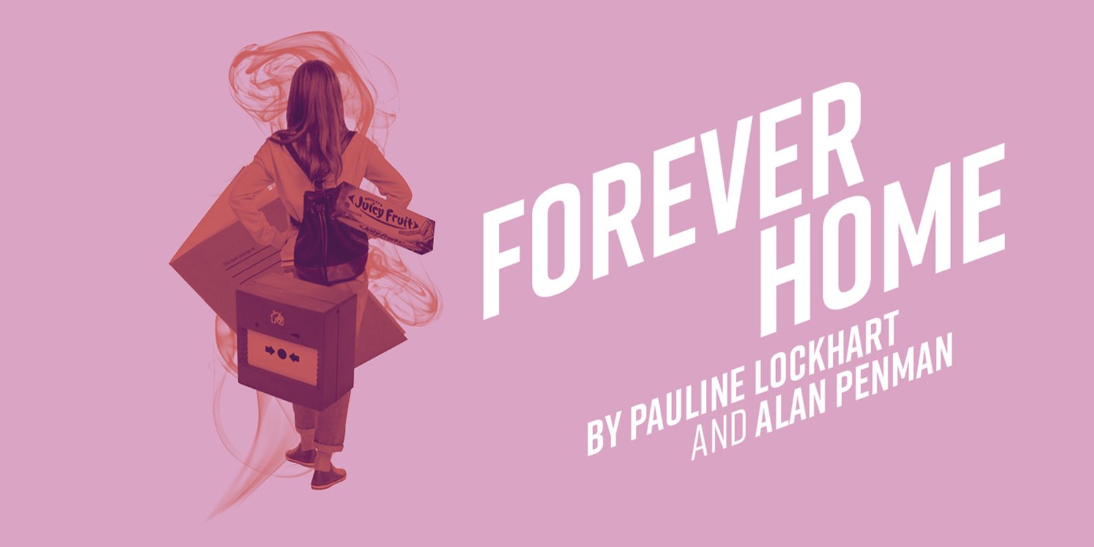 A woman with a rucksack on surrounded by a fire alarm, juicy fruit packet and a notebook.