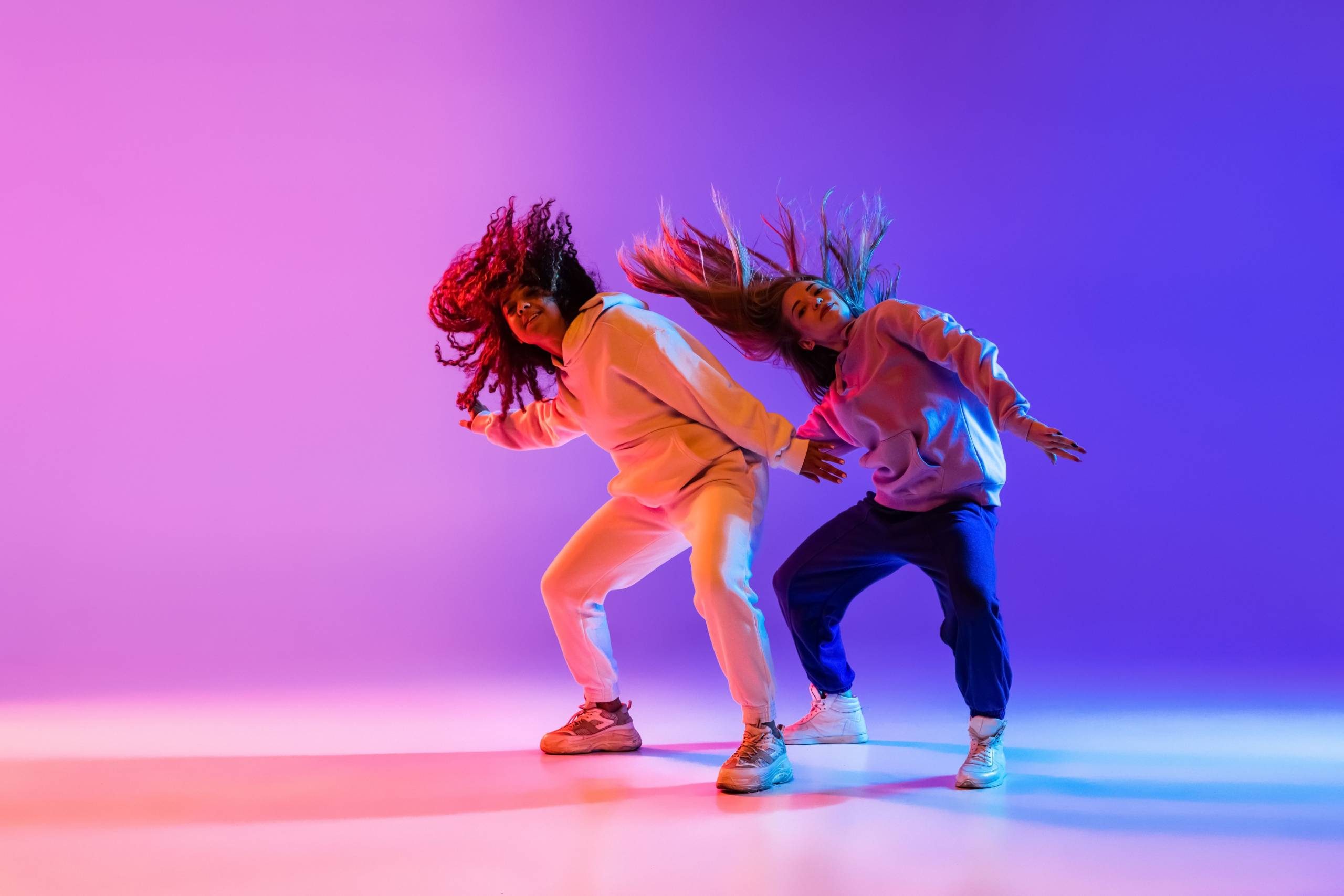 Two young people dancing