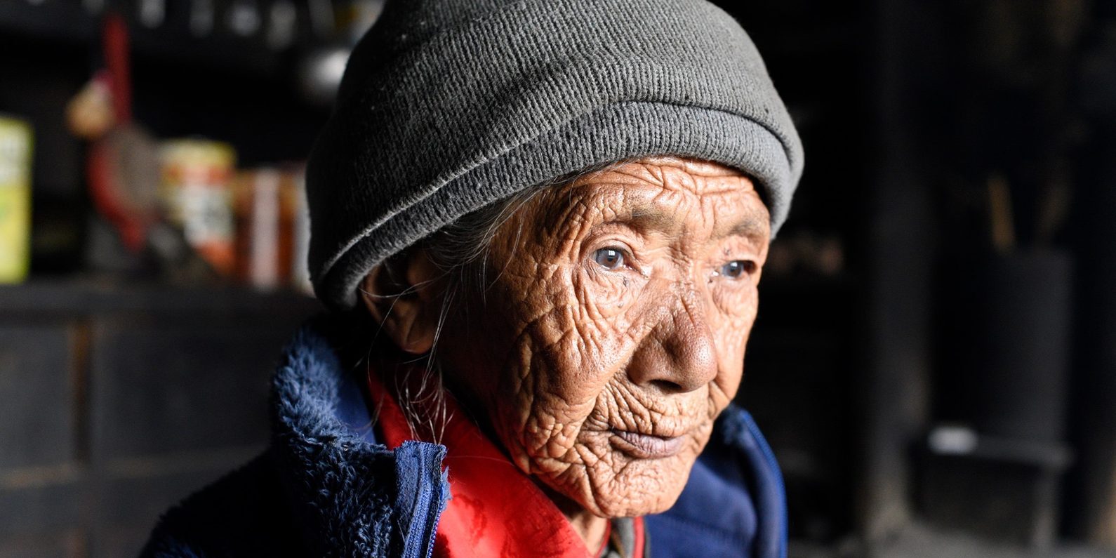 Headshot of woman wearing a hat