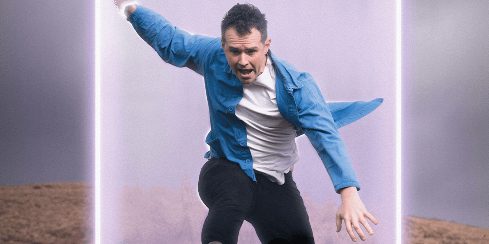 Man wearing casual clothes leaping forwards