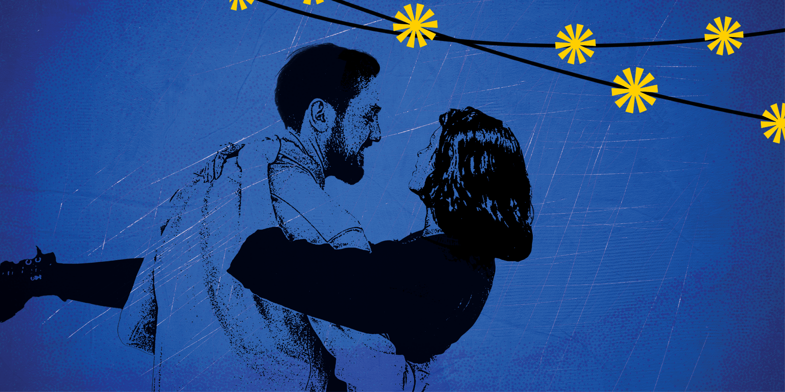 A man and woman arms wrapped around each other looking into each others eye